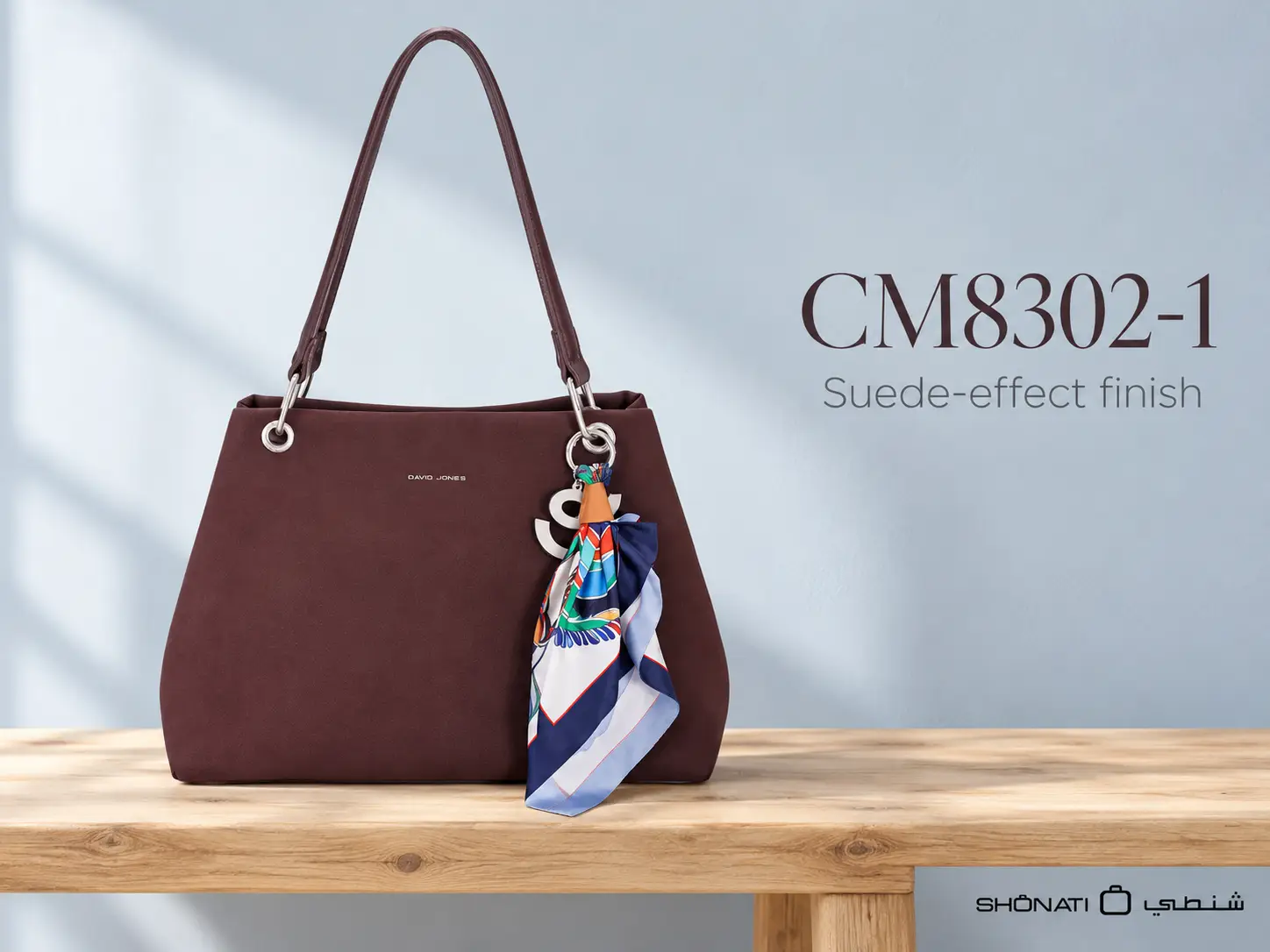 Burgundy David Jones CM8302-1 shoulder bag with scarf and charm showing its suede-effect finish