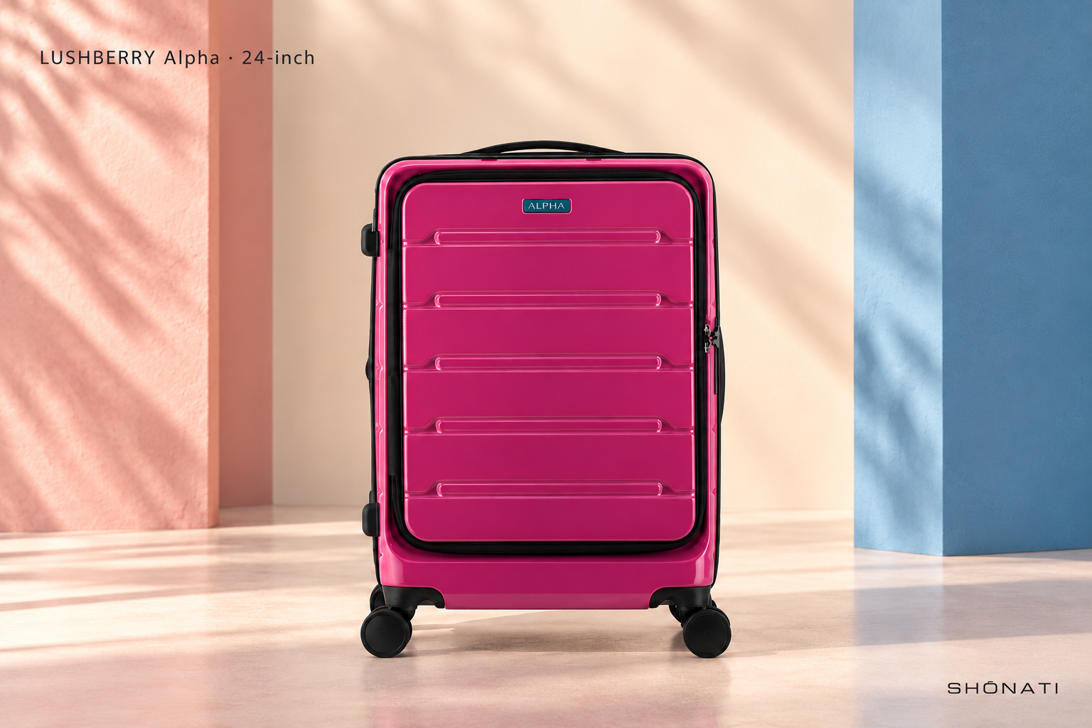 LUSHBERRY Alpha · 24-inch Ruby LUSHBERRY Alpha suitcase against a blush and pale-blue architectural background